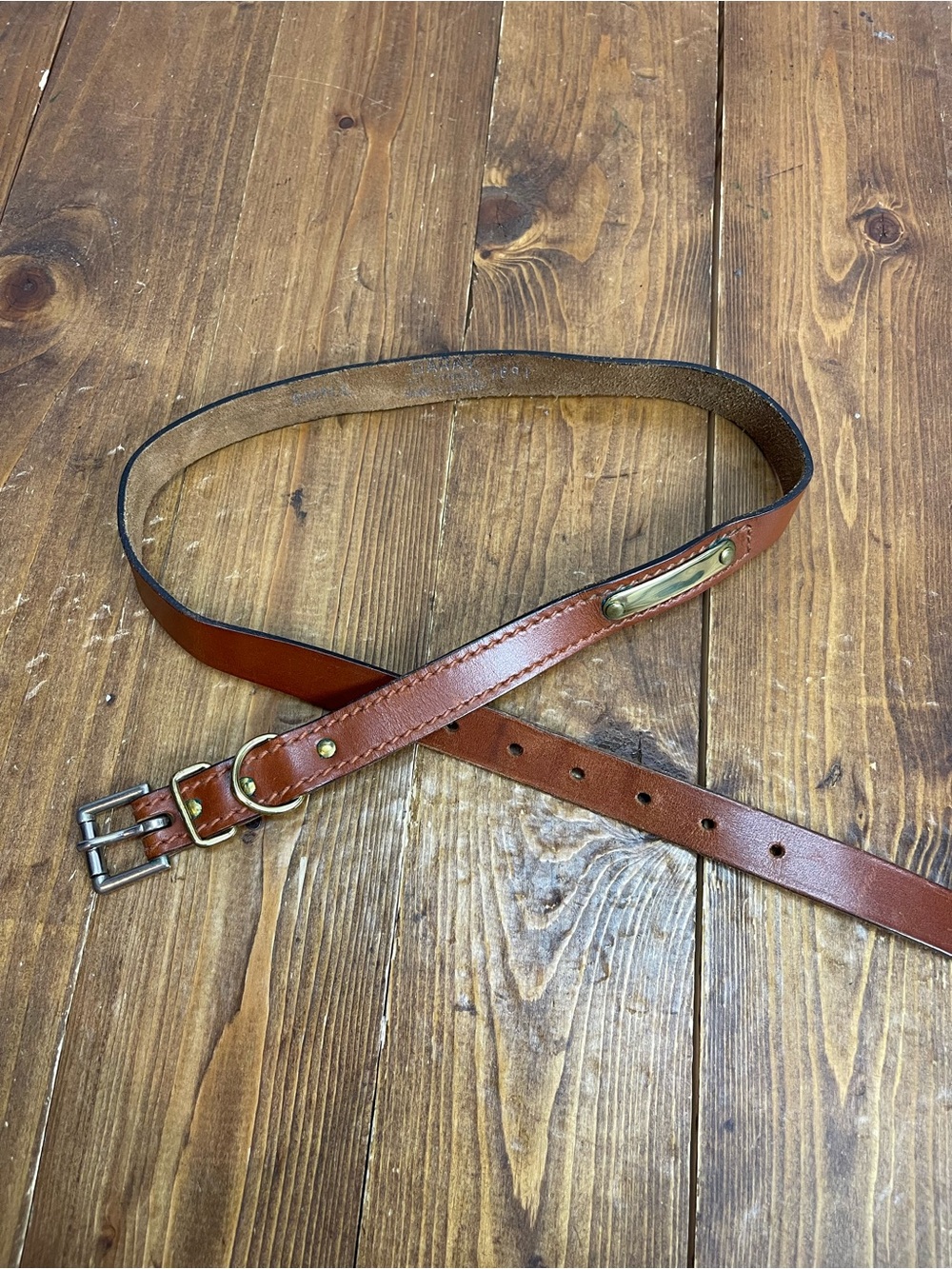Garay size small tan leather belt with brass plate